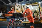 Person being placed in an ambulance